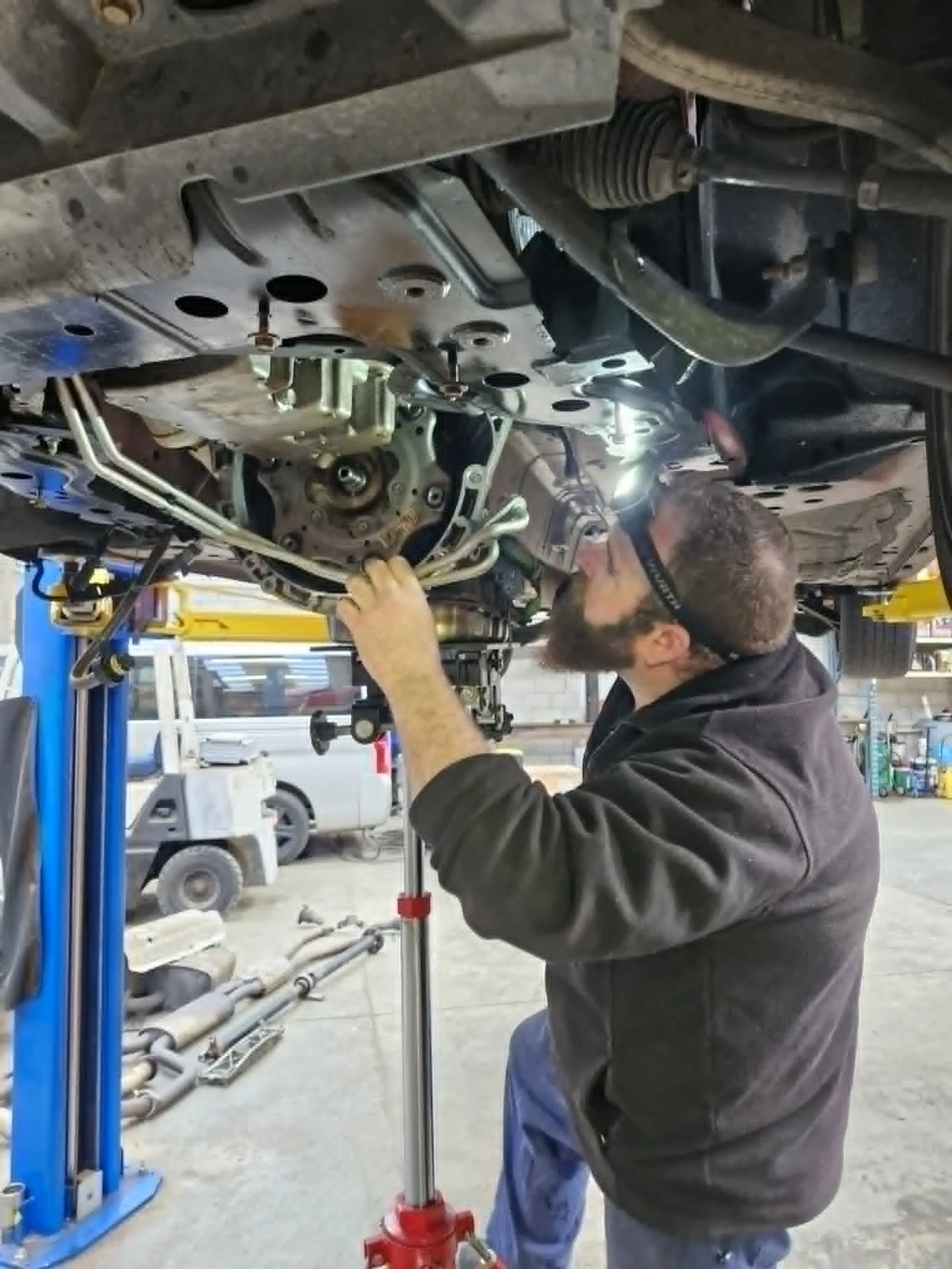 Transmission repair work being carried out by a mechanic at Holland Automotive Whanganui